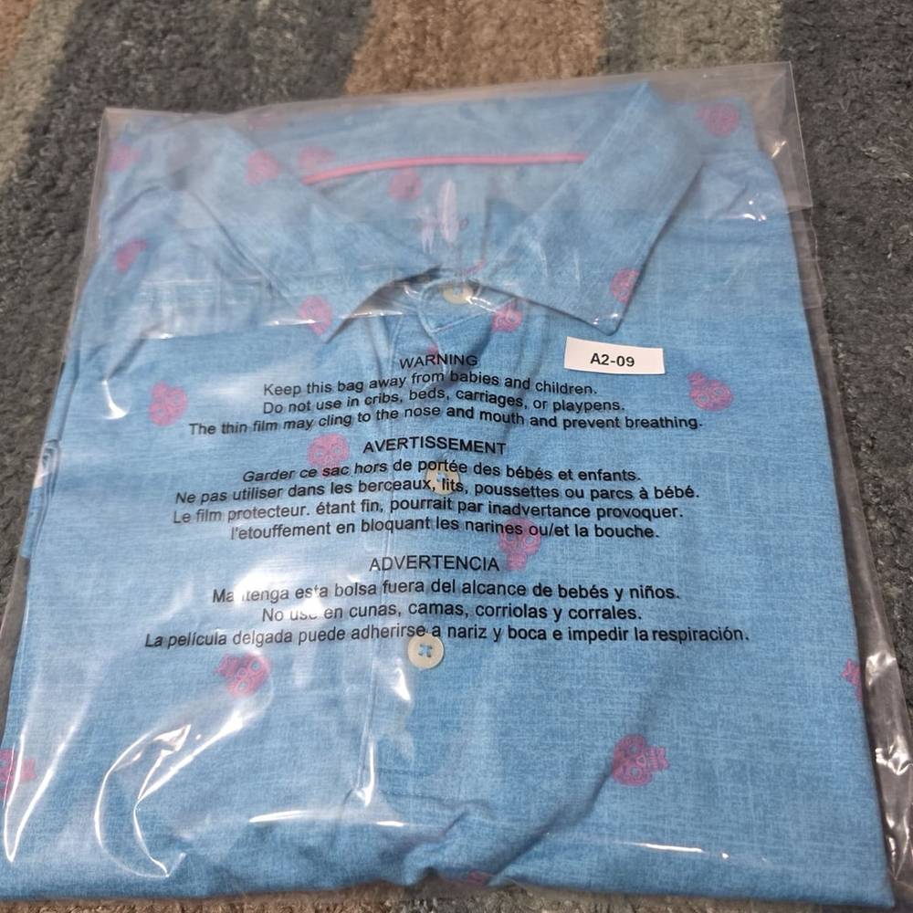 johnnie-O Blue Polo with Pink Skull Motif - Picture 11 of 11